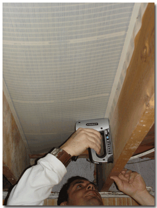 Installing the RetroHeat floor heating element.